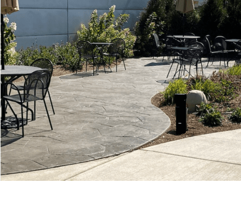 Modern landscape power pedestal installed in a scenic outdoor environment, providing discreet access to power.